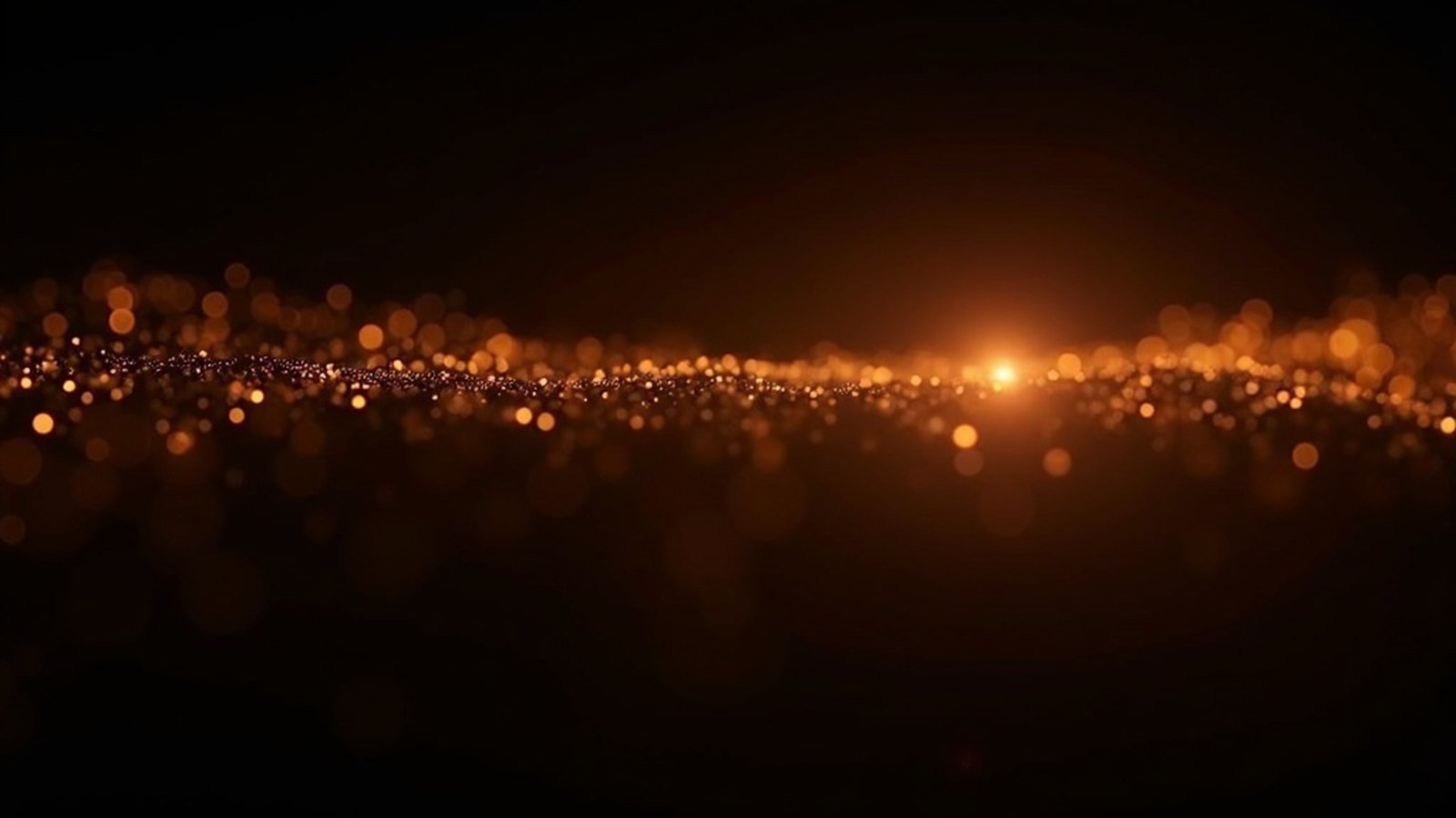 Abstract amber visualisation contrasting scattered light nodes with a dense glowing cluster on black